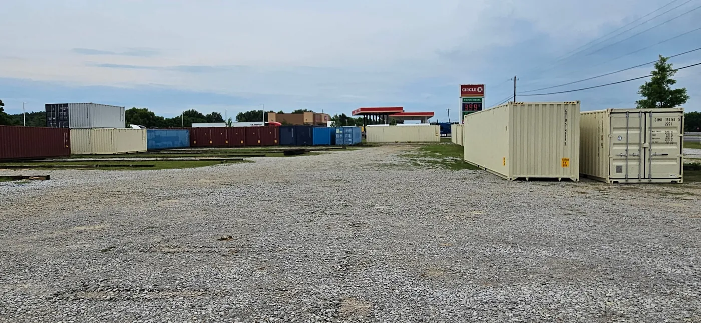 Affordable Storage Containers equipment yard at 1715 S Memorial Drive, Prattville AL, next to Circle K